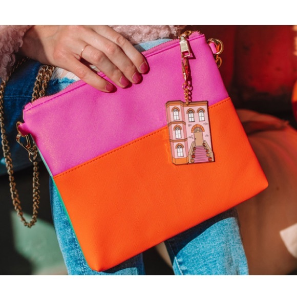 Seasonal reversible color block clutch